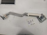 a close up of a metal door handle on a white wall