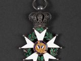 a close up of a medal on a black surface