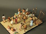 a figurine of a group of figurines on a table