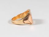 an image of a gold ring with a diamond on it