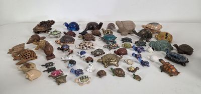 a lot of small figurines that are on the table