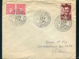 une vieille enveloppe avec deux timbres et un timbre sur lequel figure l'image d'un homme