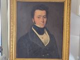 tableau représentant un homme en costume noir et chemise blanche