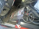 a car battery in the trunk of a vehicle