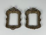 pair of antique gold picture frames on a white background