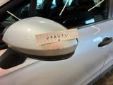 a sticker on the side mirror of a car