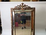 a man taking a picture of himself in a mirror