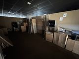 a room full of boxes and boxes in the middle of the room