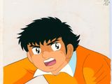 cellule d'animation représentant un jeune homme vêtu d'une veste orange et d'une chemise blanche