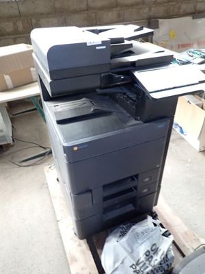 a printer that is sitting on top of a pallet