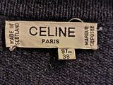 a label on a sweater that says celine paris