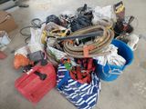 a pile of assorted items sitting on the floor