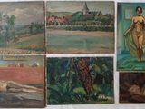 several paintings of a woman laying on a bed in a room