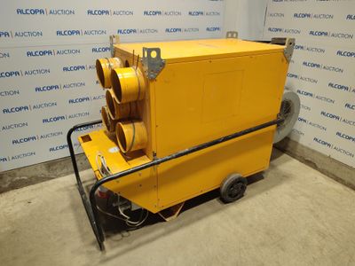 une image représentant une machine jaune posée sur un sol en béton