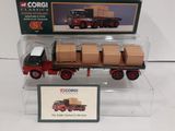a toy truck with boxes on the back of it