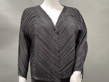 an image of a mannequin mannequin wearing a black and white top