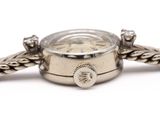 an image of a wrist watch with a chain around it