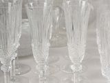 a lot of wine glasses sitting on a table