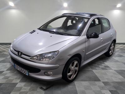 a picture of a silver car parked in a garage
