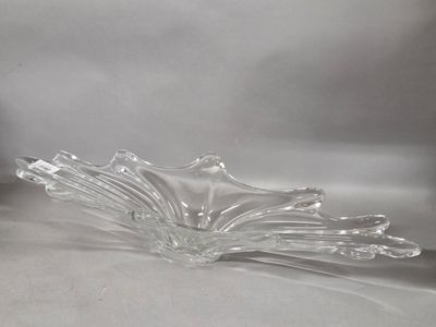 a glass bowl that is sitting on a table
