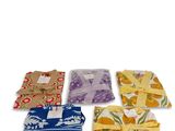 four pieces of cloth with different designs on them