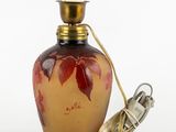an image of a glass bottle with a cord attached to it