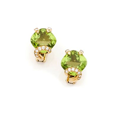 pair of peridot and diamond earrings on a white background