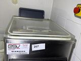 an image of a kitchen with a washer and a sink