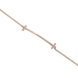 a rose gold bracelet with a cross on a chain