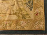 a rug with a picture of a woman and a bird on it