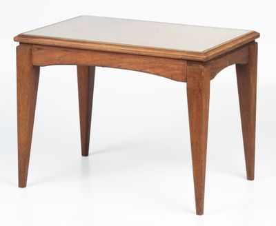 an image of a small wooden table with a glass top