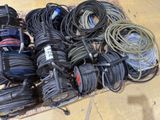 a lot of wires and cords on a pallet