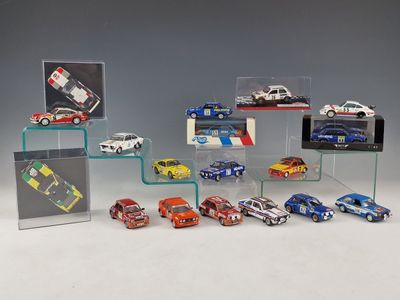 a lot of cars that are on display in a display case