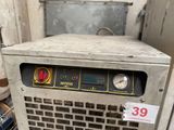 a machine that is sitting inside of a building