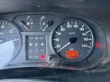 a close up of a car dashboard with a speedometer