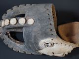 a close up of a baseball glove on a table