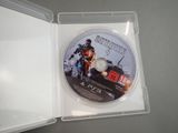 a game disc in a clear case on a table
