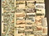 several old postcards of different types and sizes on a table