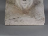a sculpture of a polar bear on display on a table