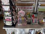 a table that has a lot of craft supplies on it