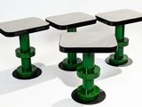 three tables that are sitting on top of each other