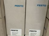 three boxes of festo are stacked on top of each other on a table