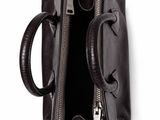 the small black bag is open and ready to be carried