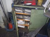 a picture of a workbench with a bunch of tools on top of it