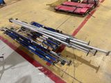 a lot of skis that are sitting on the ground