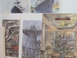 a lot of cards on the table with pictures on them