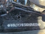 a close up of a motorcycle with a number plate on it