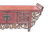 a wooden table with drawers and a drawer on top of it
