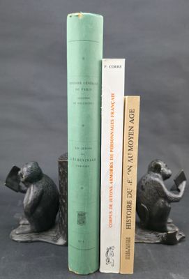 two books that are sitting next to each other on a table