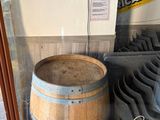 a glass case with a wooden barrel and a number 8 on it